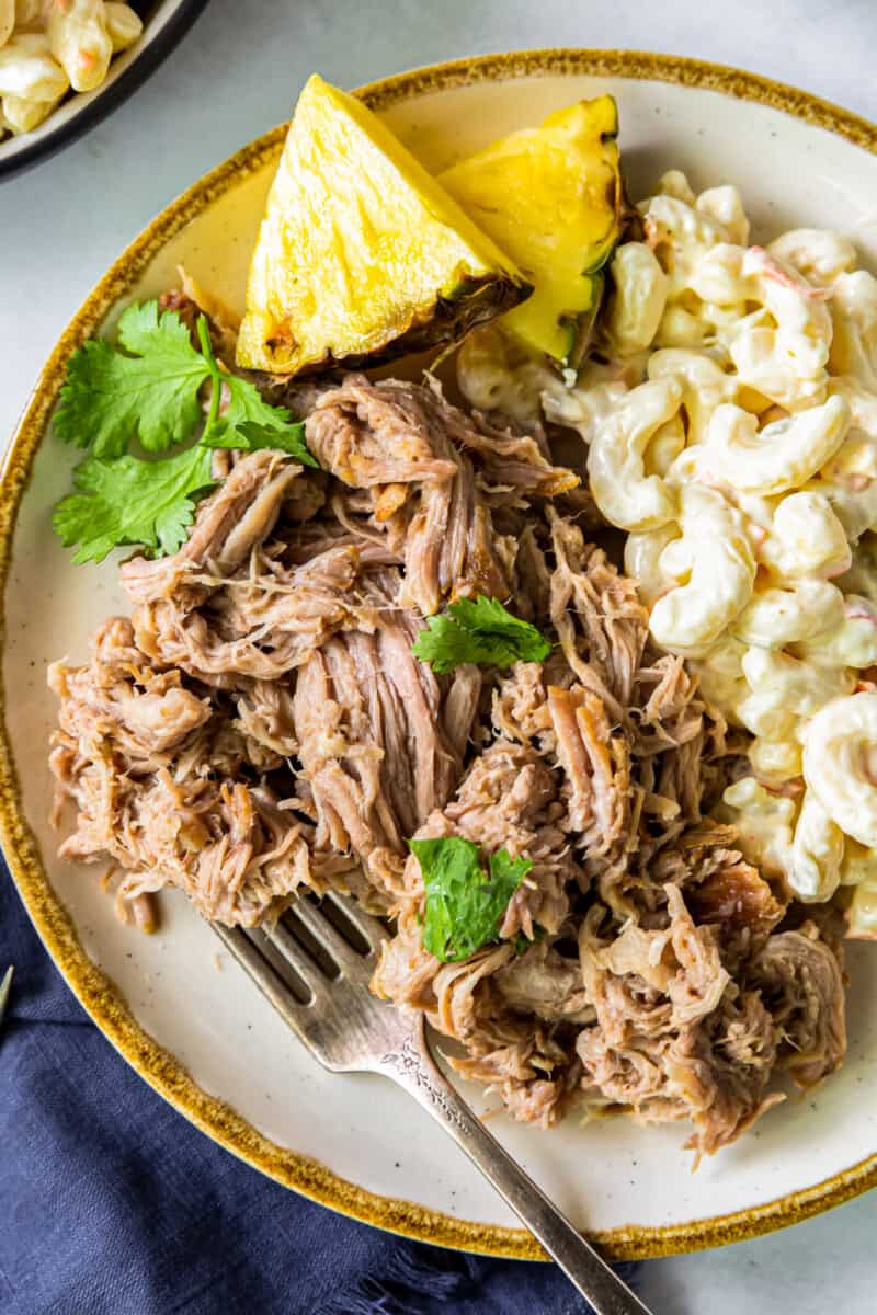 up close plate of kalua pork with macaroni salad