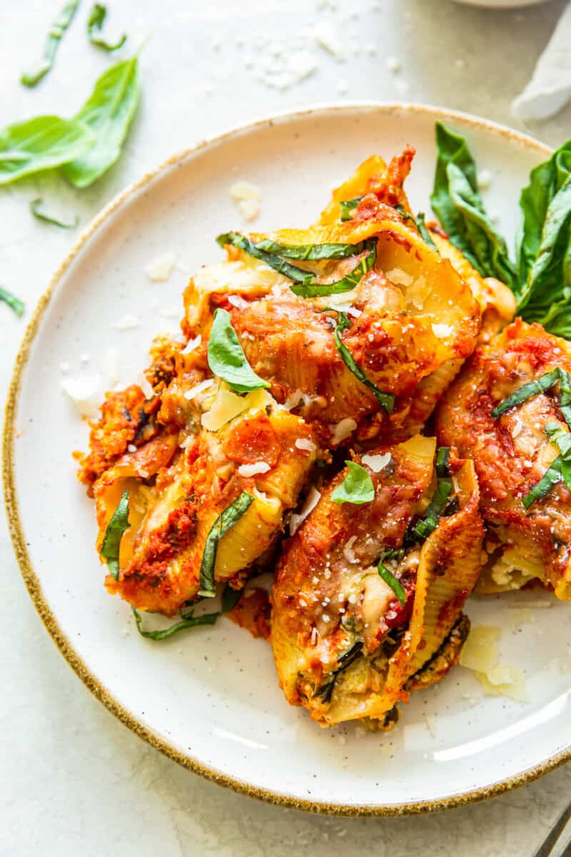 up close crockpot stuffed shells on white plate