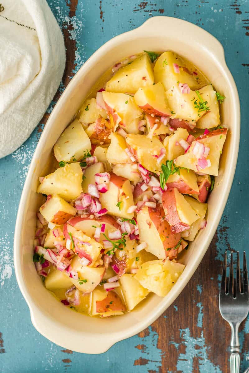 german potato salad with bacon in serving dish