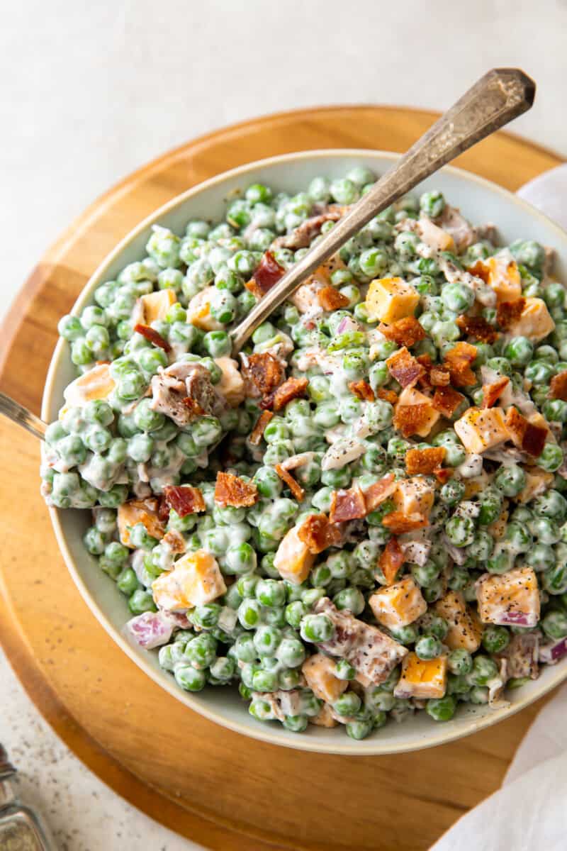 bowl of creamy pea salad with bacon