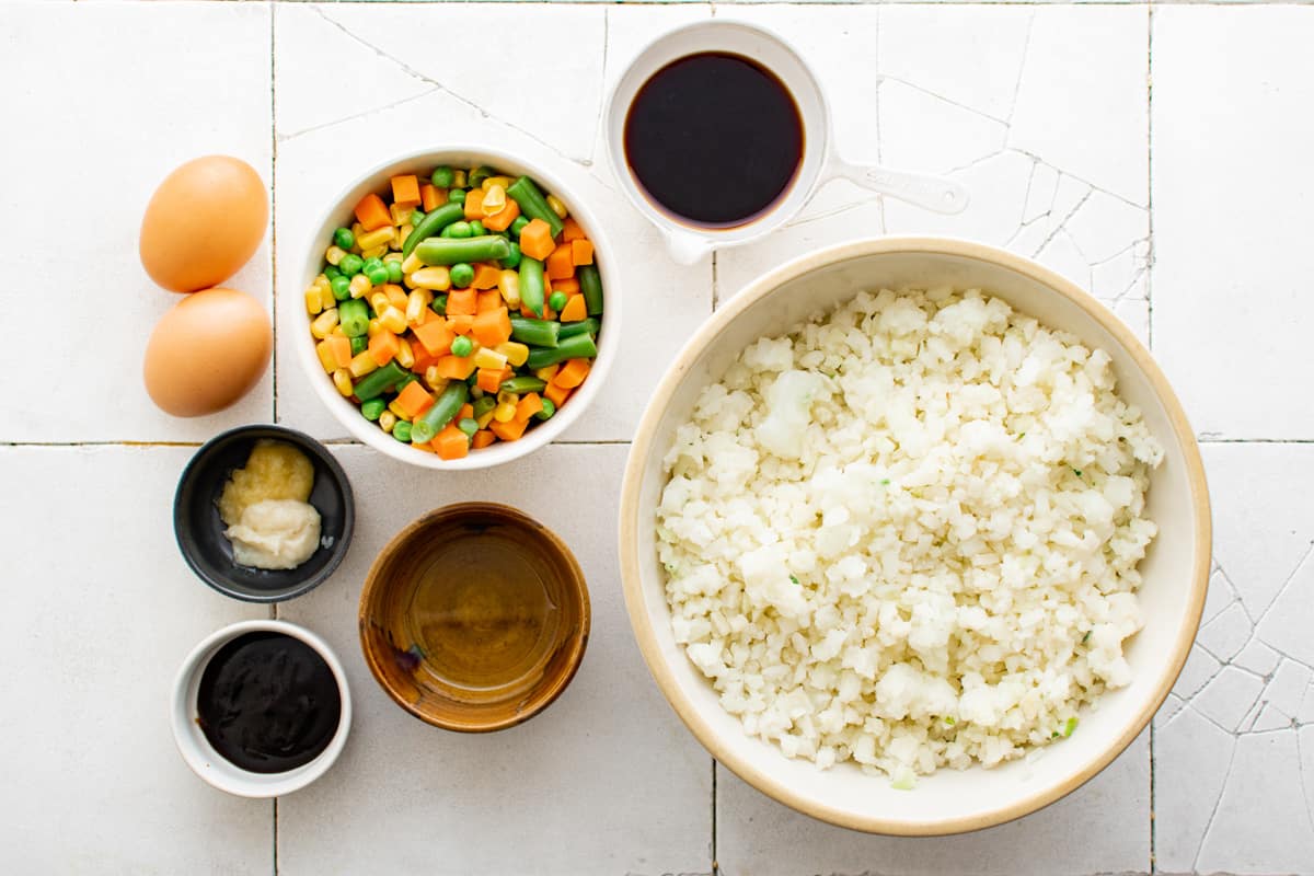 overhead view of ingredients for cauliflower fried rice.