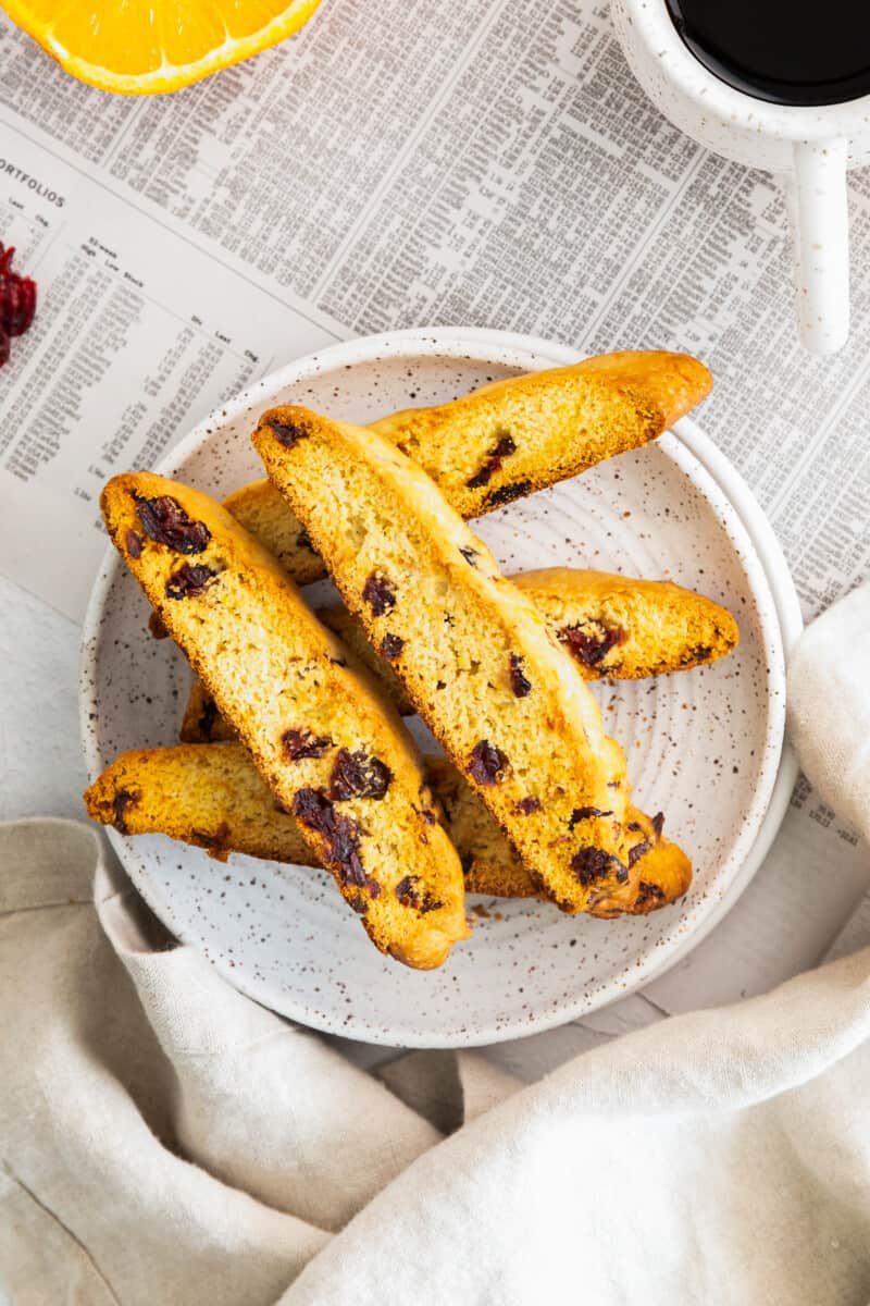 cranberry orange biscotti on gray plate