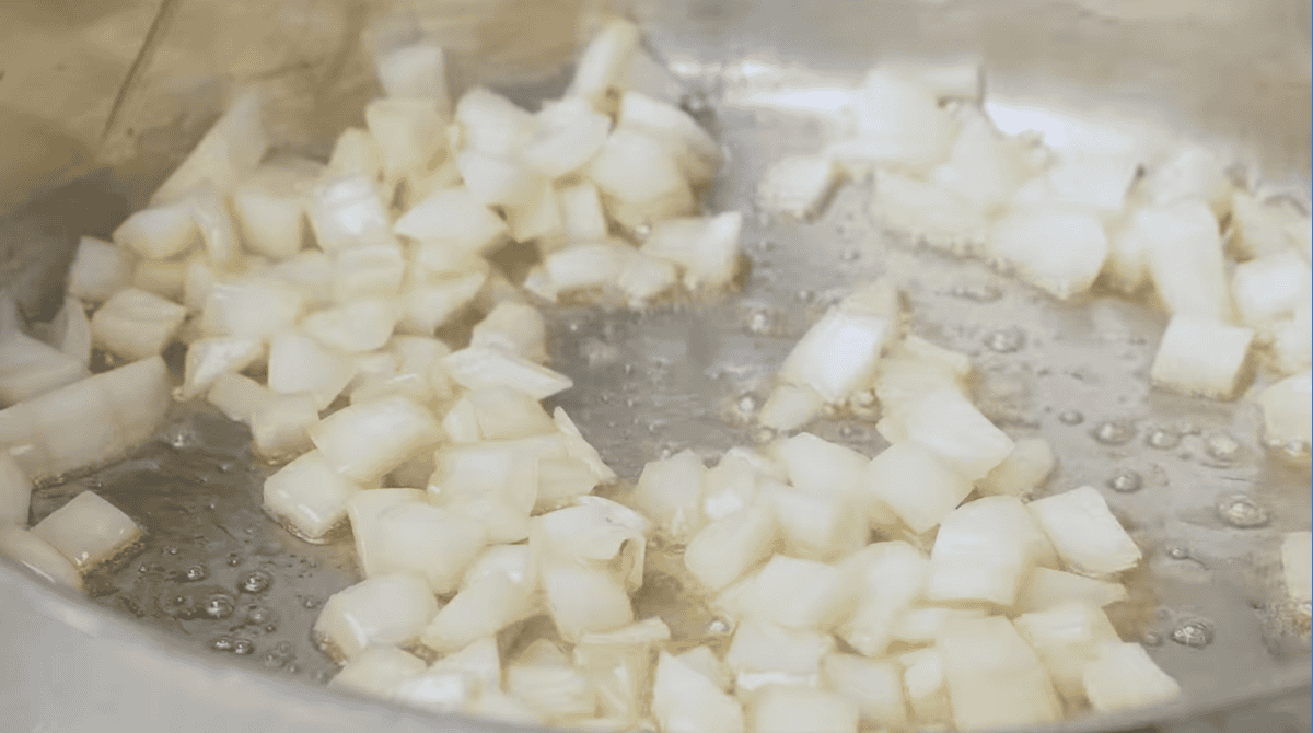 sauteed onions in a pan.