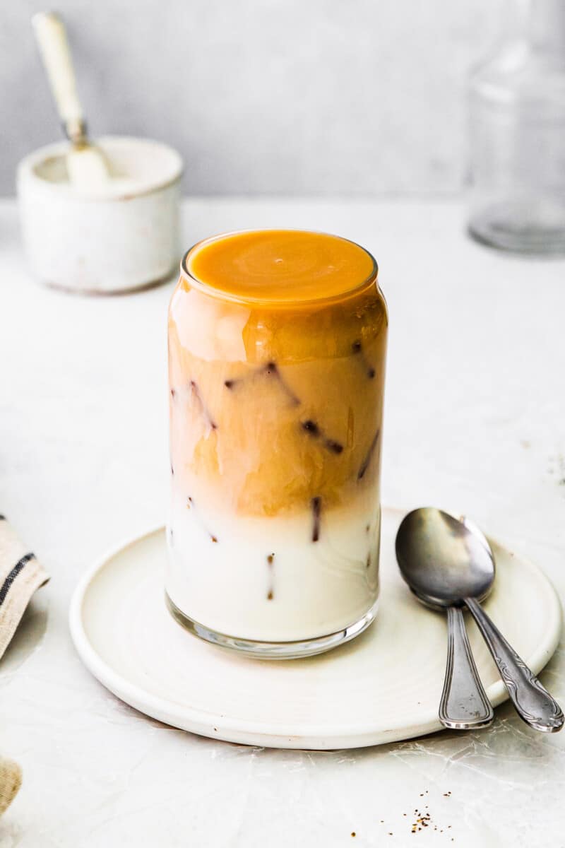 iced chai tea latte in glass cup