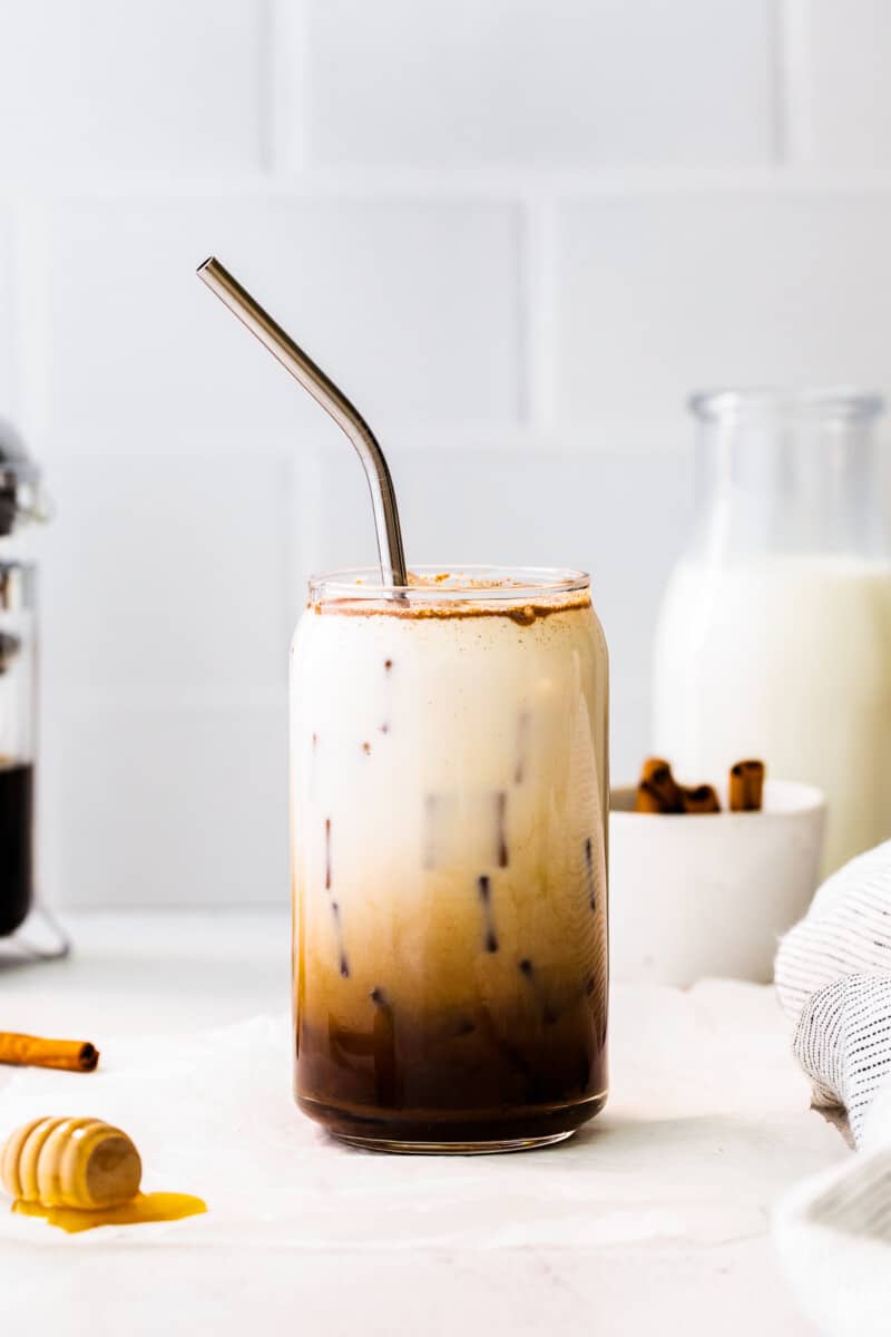 iced honey cinnamon latte with straw