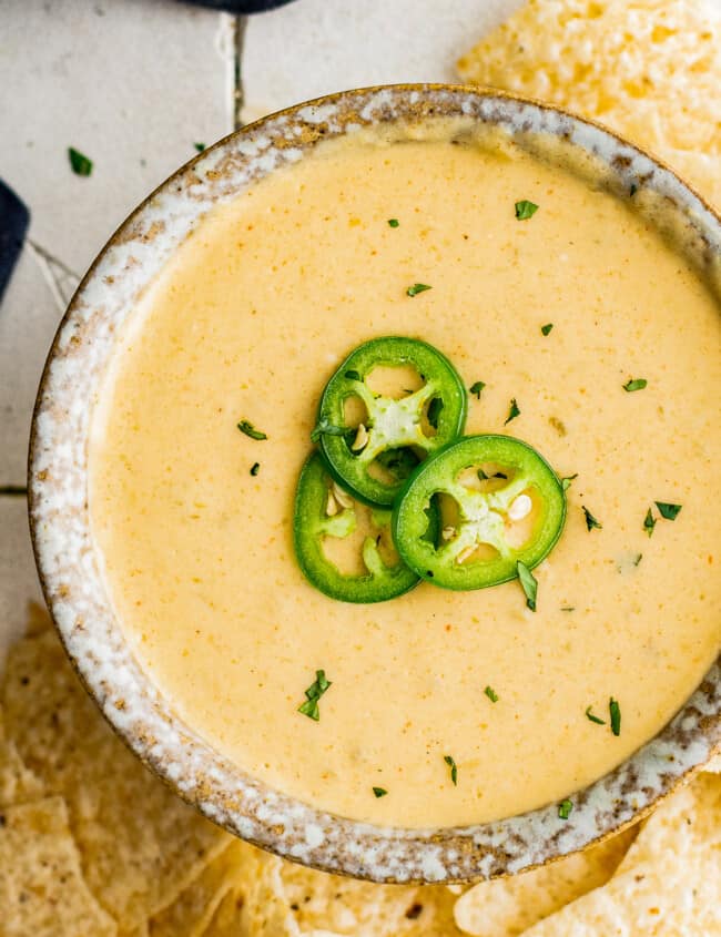 up close bowl of instant pot queso blanco with jalapenos