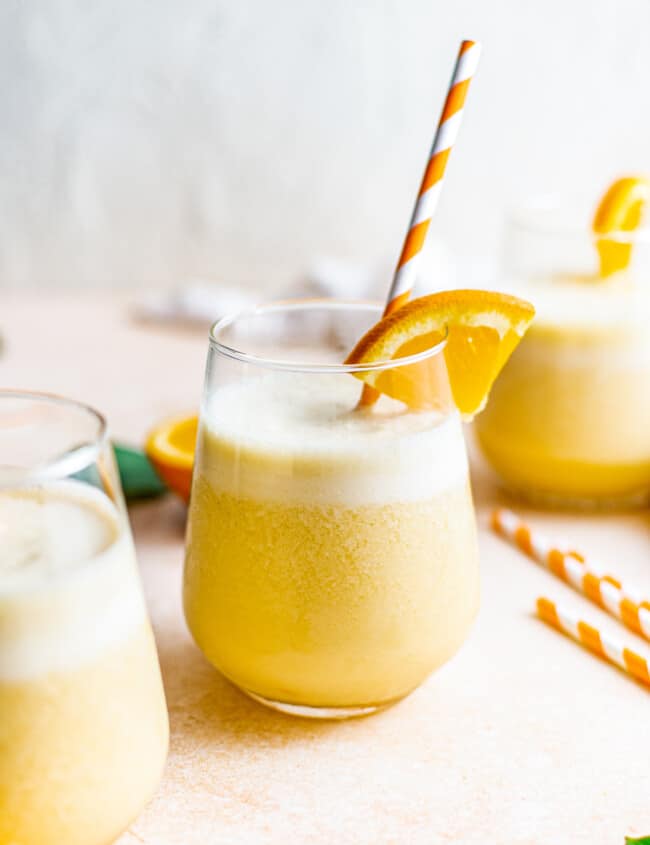 homemade orange julius with striped straws