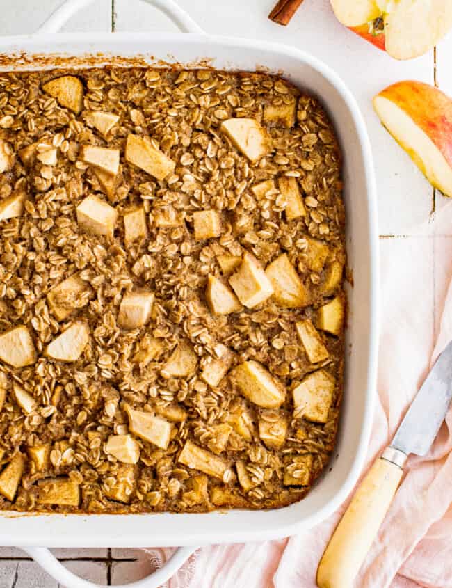 apple baked oatmeal in white baking dish