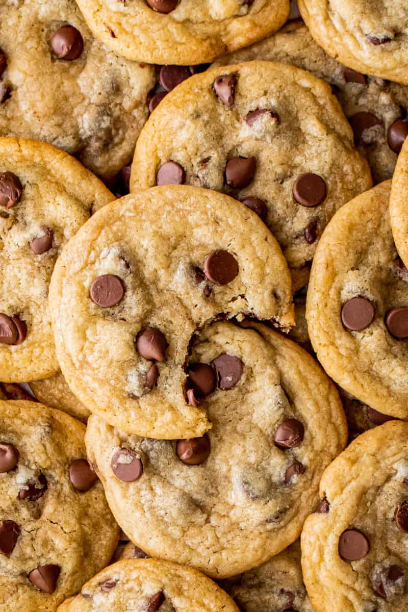 brown butter chocolate chip cookies with a bite taken out of one