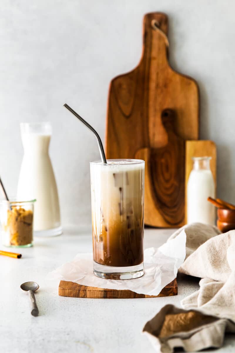 iced brown sugar shaken espresso in a clear glass with a straw