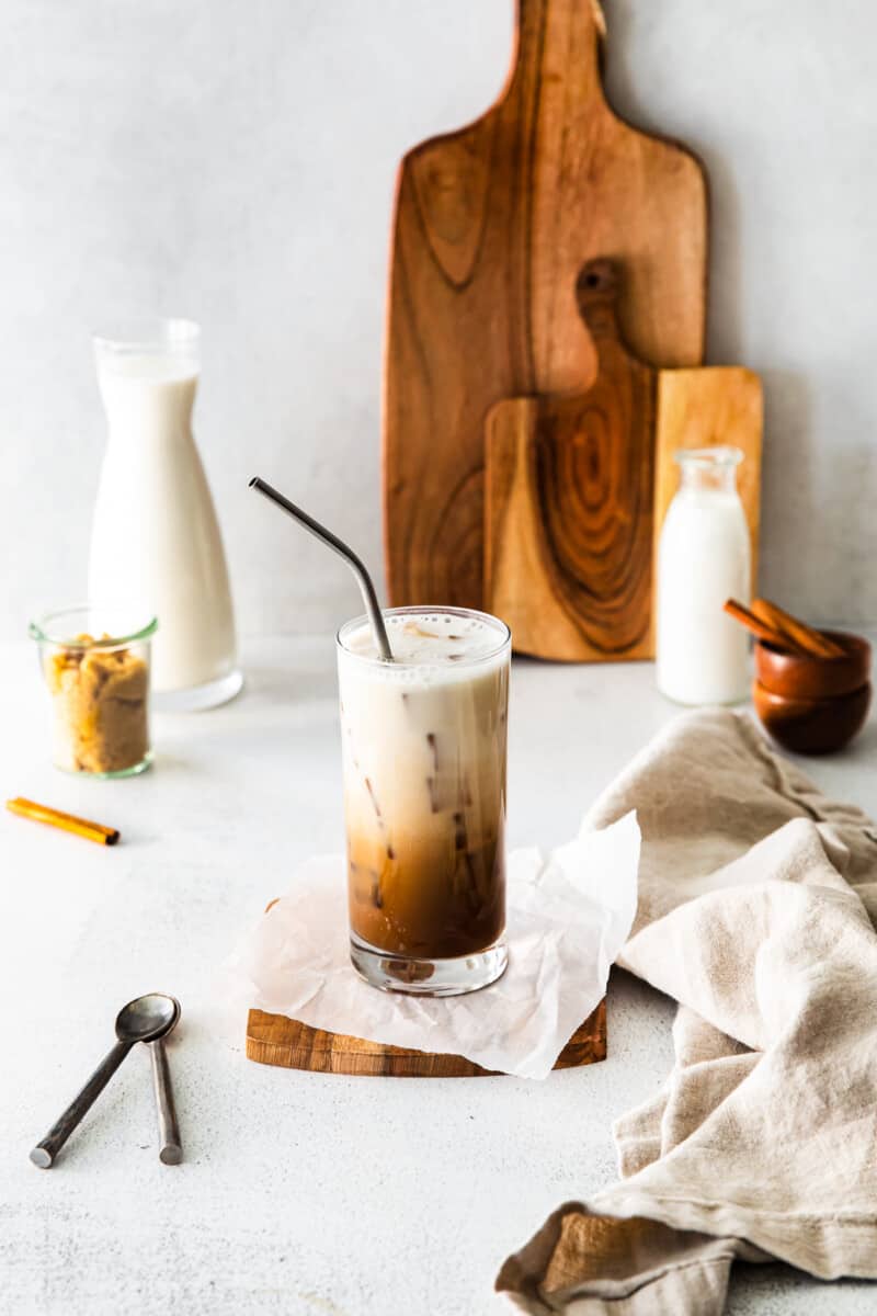 iced brown sugar shaken espresso in a clear glass with a straw