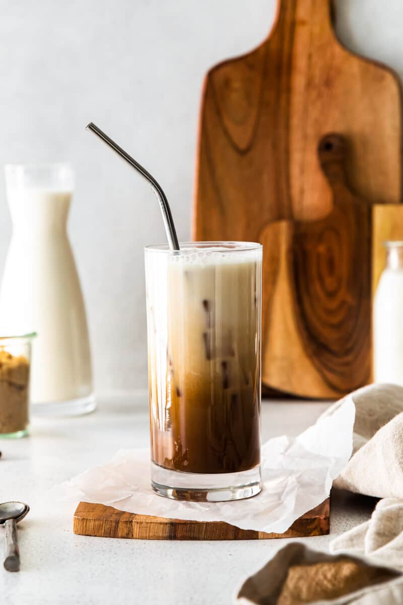 iced brown sugar shaken espresso in a clear glass with a straw