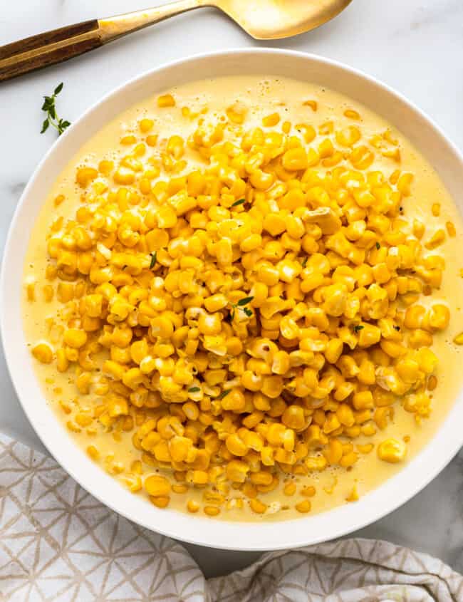 white glass bowl with creamed corn