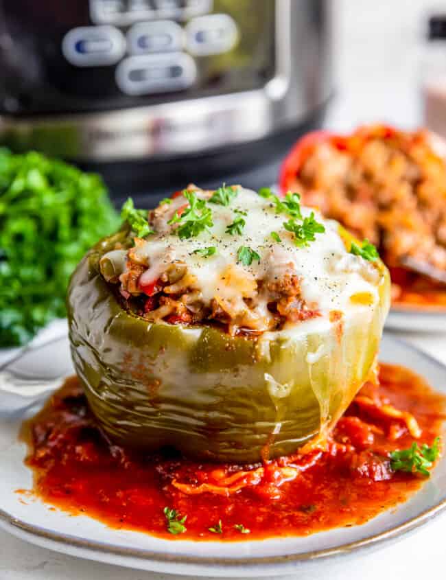 crockpot stuffed pepper with sauce on a plate