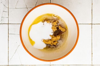 wet ingredients for brown butter chocolate chip cookies in a bowl before mixing