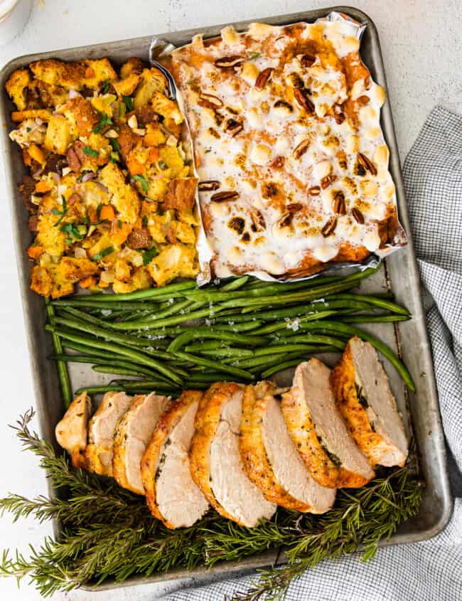 4 parts of sheet pan thanksgiving including sweet potato casserole, dressing, green beans, and turkey breast