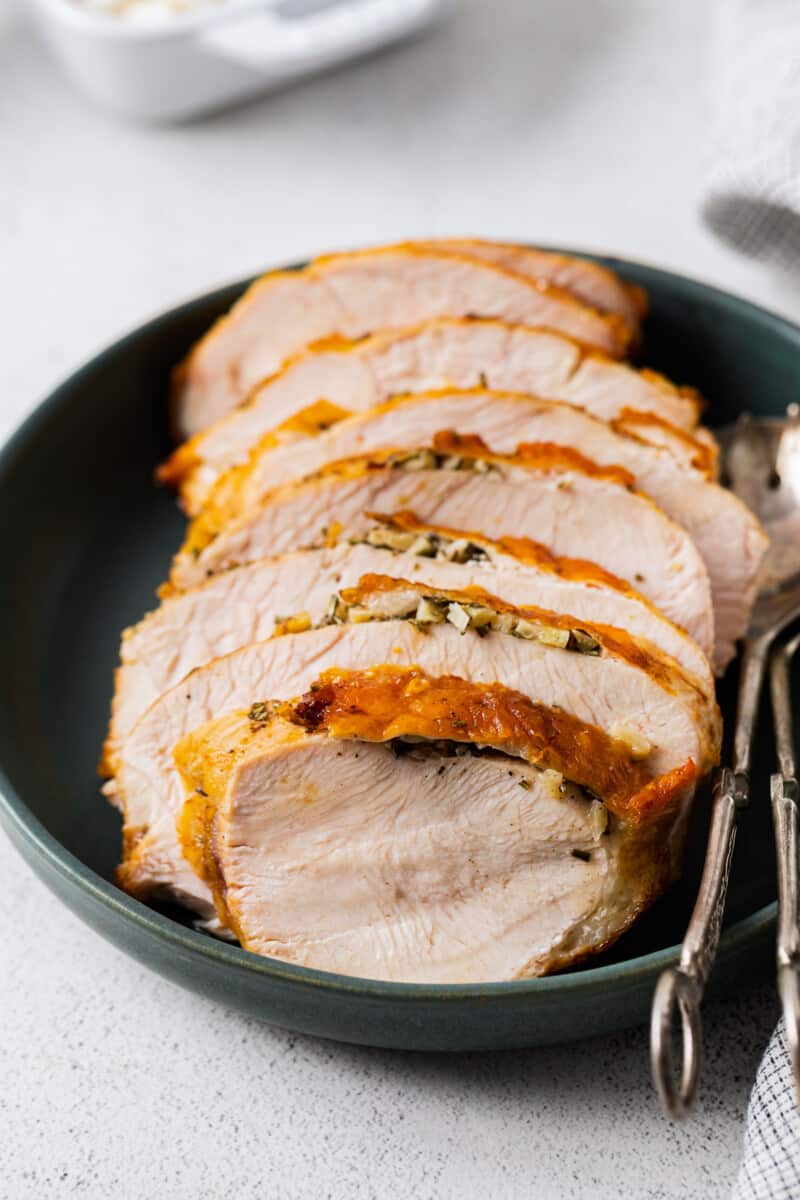 sliced turkey breast on a serving platter