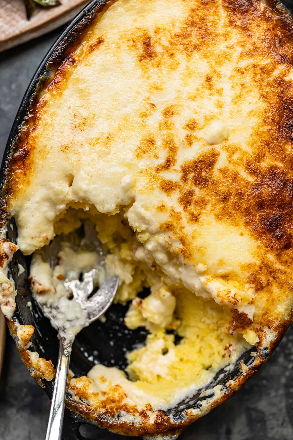 serving spoon in a dish of chantilly potatoes