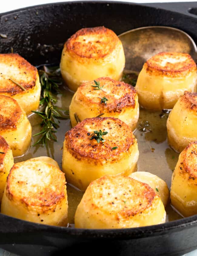 fondant potatoes in a skillet