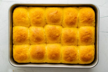 sweet potato rolls in a baking dish after baking