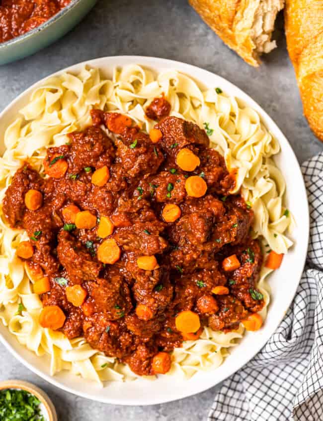 hungarian beef goulash with egg noodles in a serving bowl