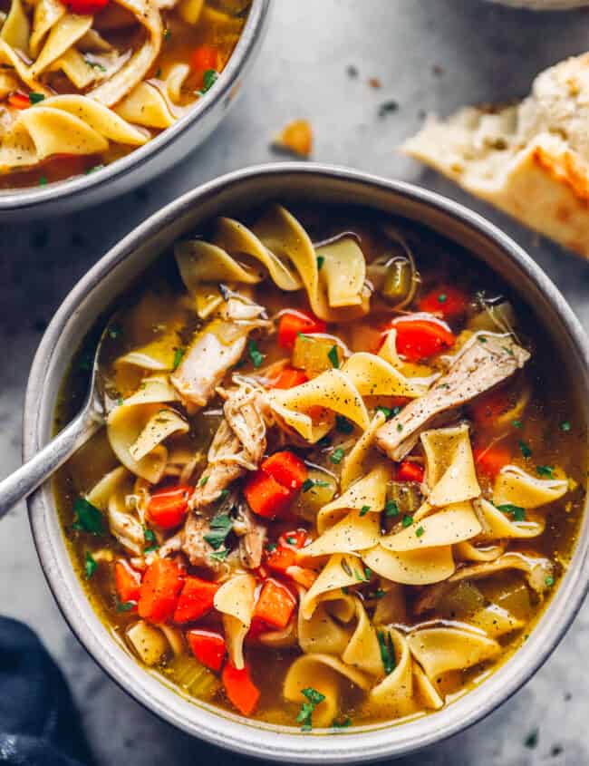 up close gray bowl of instant pot chicken noodle soup