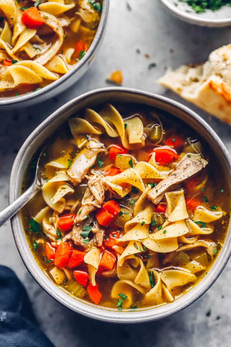 up close gray bowl of instant pot chicken noodle soup