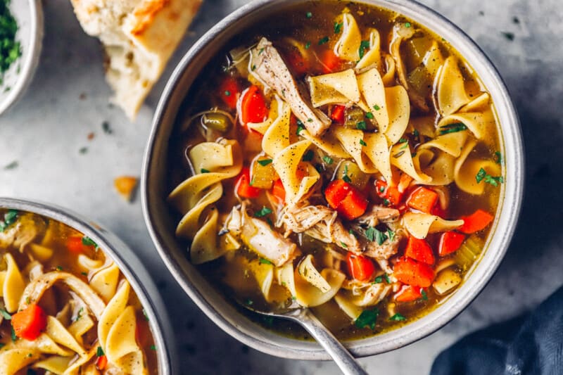 up close gray bowl of instant pot chicken noodle soup