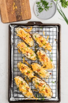 8 twice baked potatoes before baking on a cooling rack