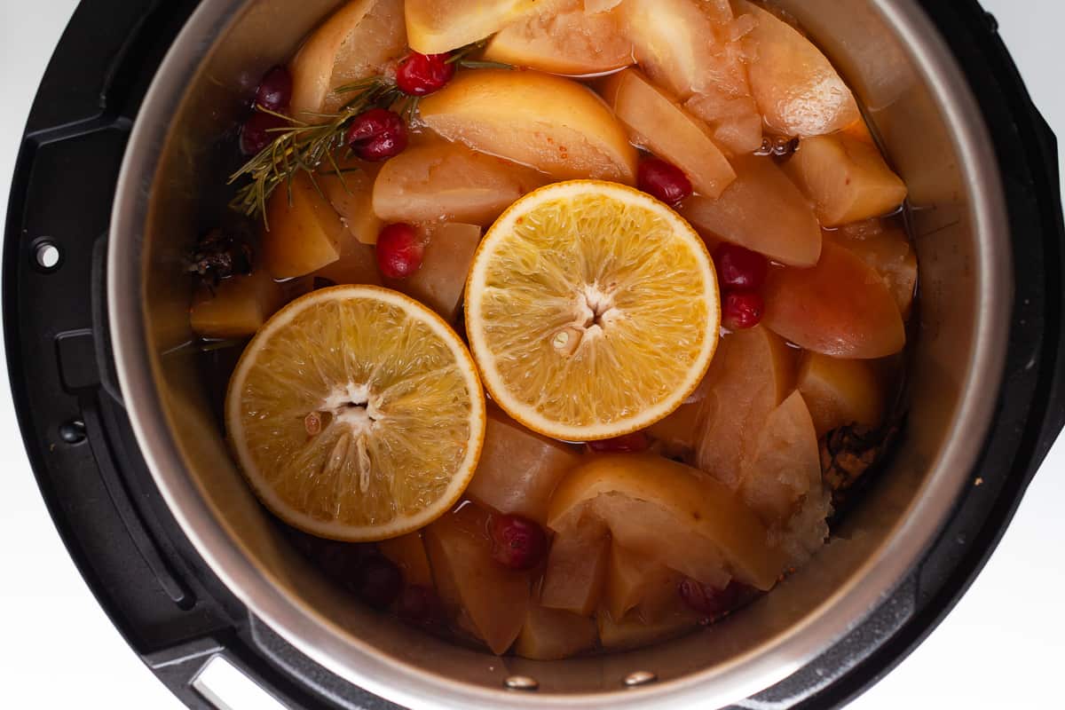 Cooked apple cider in a pressure cooker.