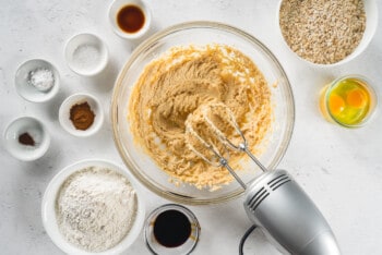 creamed butter and sugar in a glass bowl with a hand mixer