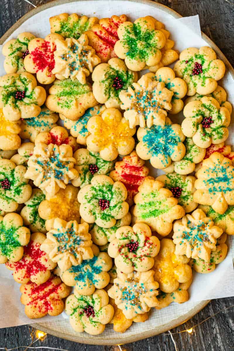 spritz cookies on a white serving platter