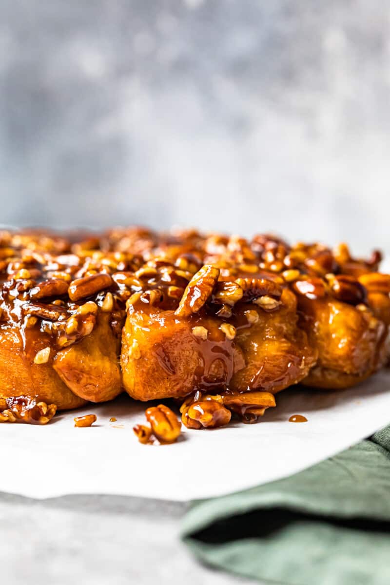 caramel pecan sticky buns on a white serving tray