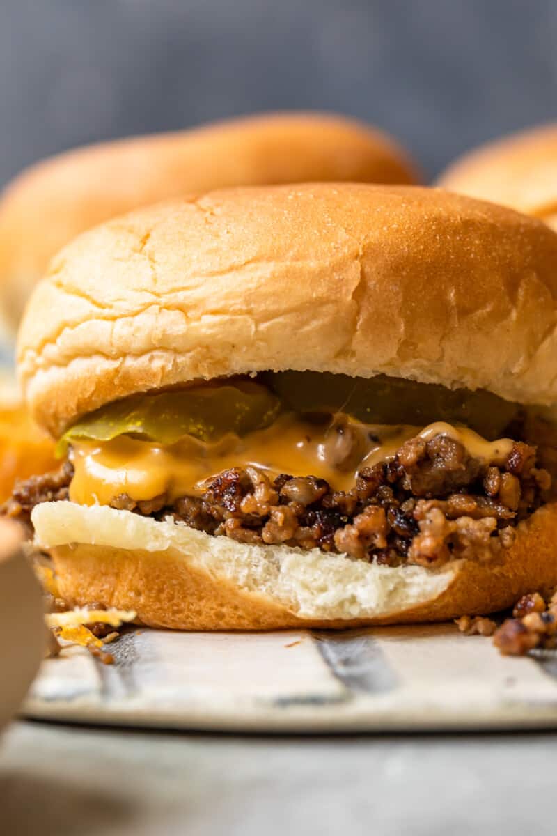 maid rite sandwiches topped with cheese and pickles