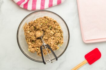 apple cinnamon breakfast cookie dough with a cookie scoop