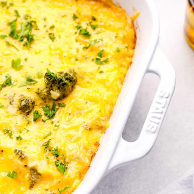 broccoli rice casserole in a white baking dish