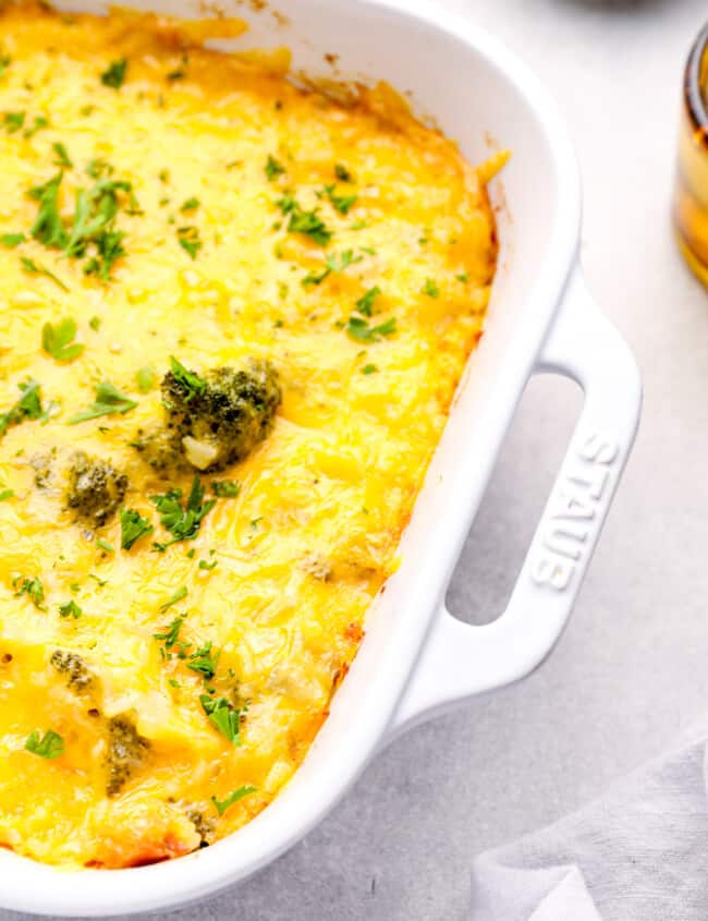 broccoli rice casserole in a white baking dish