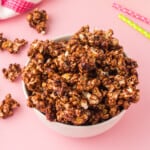 chocolate popcorn in a white bowl