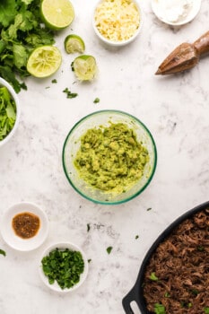 guacamole in a glass bowl