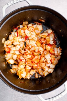 sautéed onions and garlic in a Dutch oven