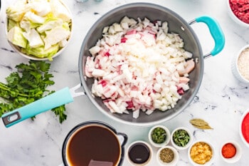 diced onions and bacon in a skillet