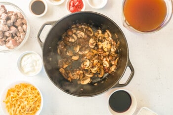 onions and mushrooms in a pot