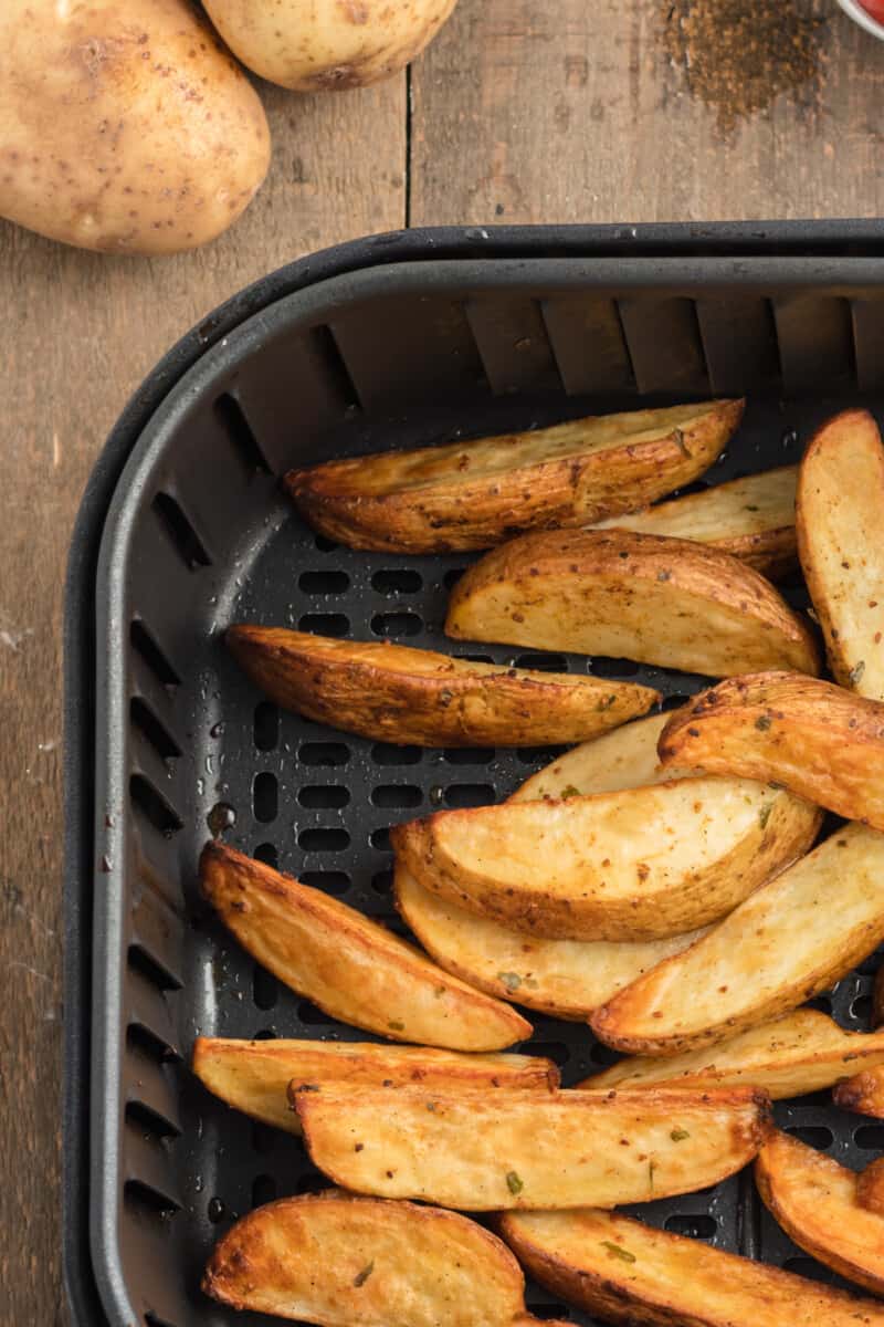 air fryer potato wedges in air fryer after cooking