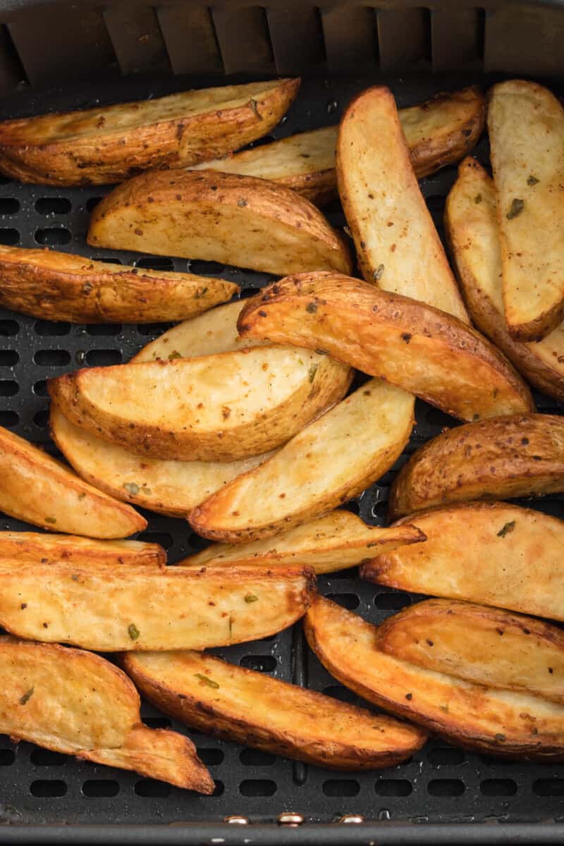 air fryer potato wedges in air fryer after cooking