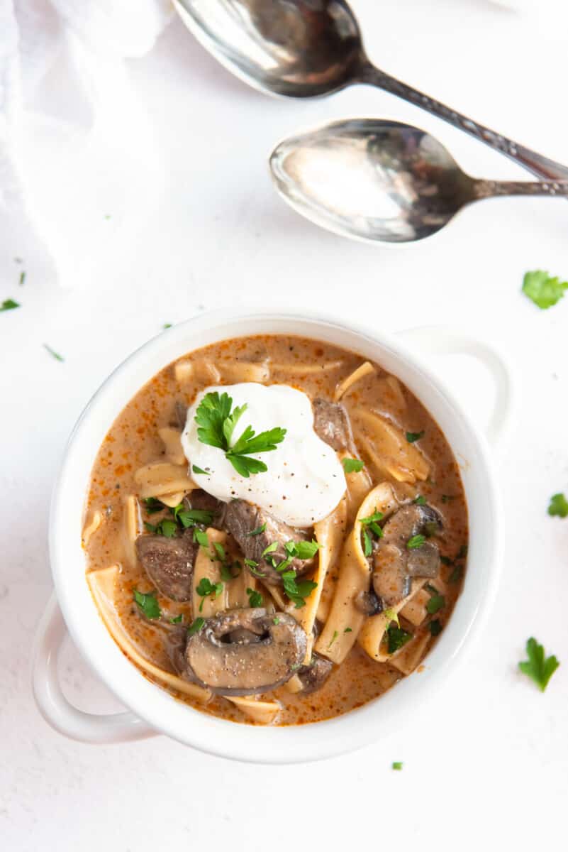 beef stroganoff soup in a white bowl