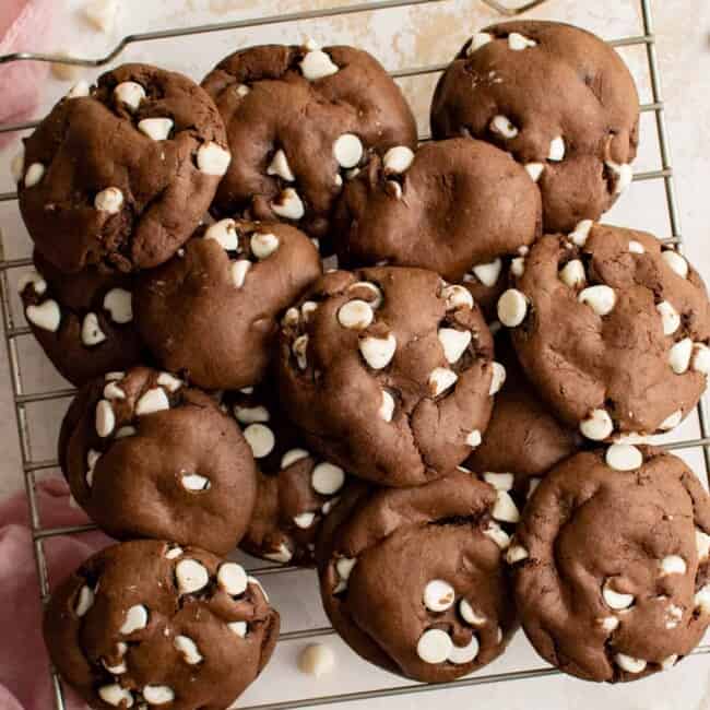 overhead view of chocolate cake mix cookies on a cooling rack.