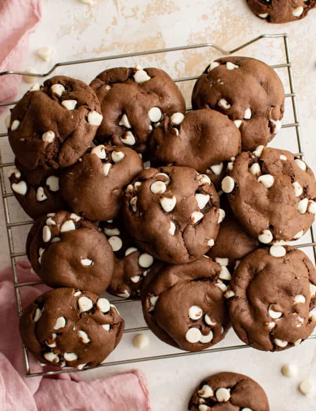 overhead view of chocolate cake mix cookies on a cooling rack.