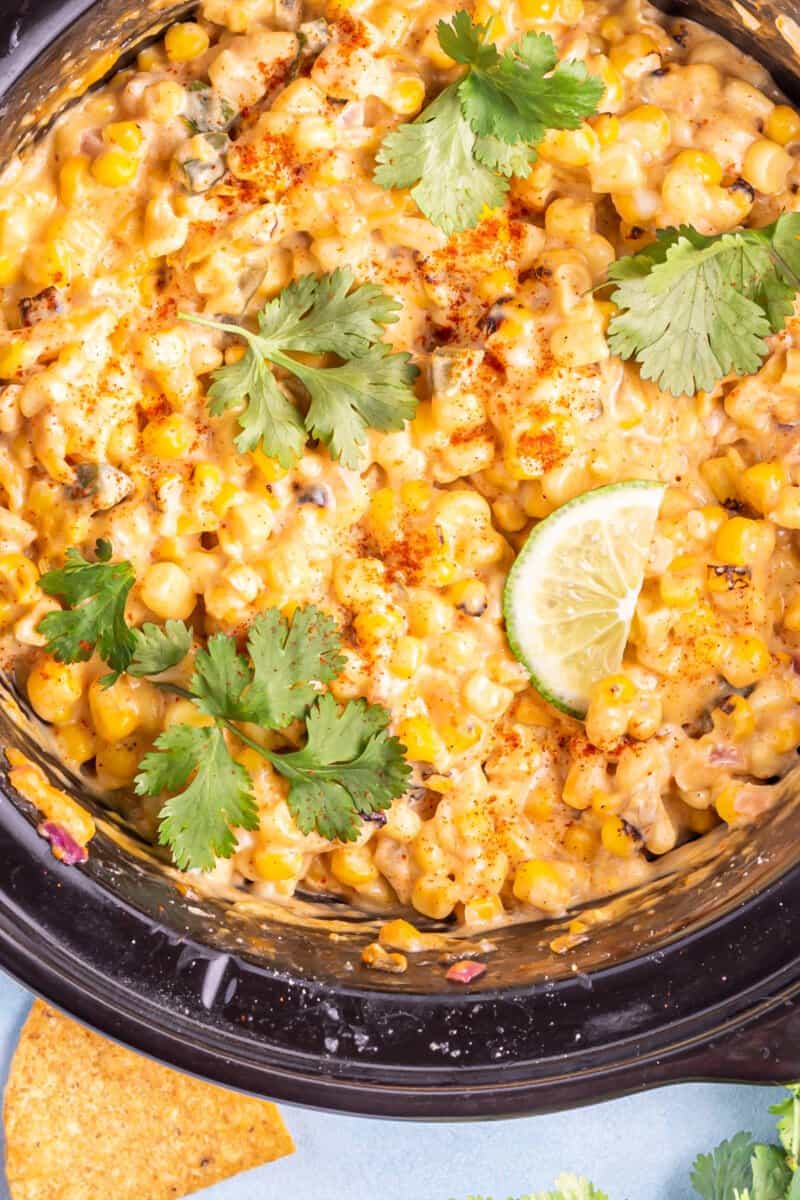 close up of crockpot corn dip in a crockpot.