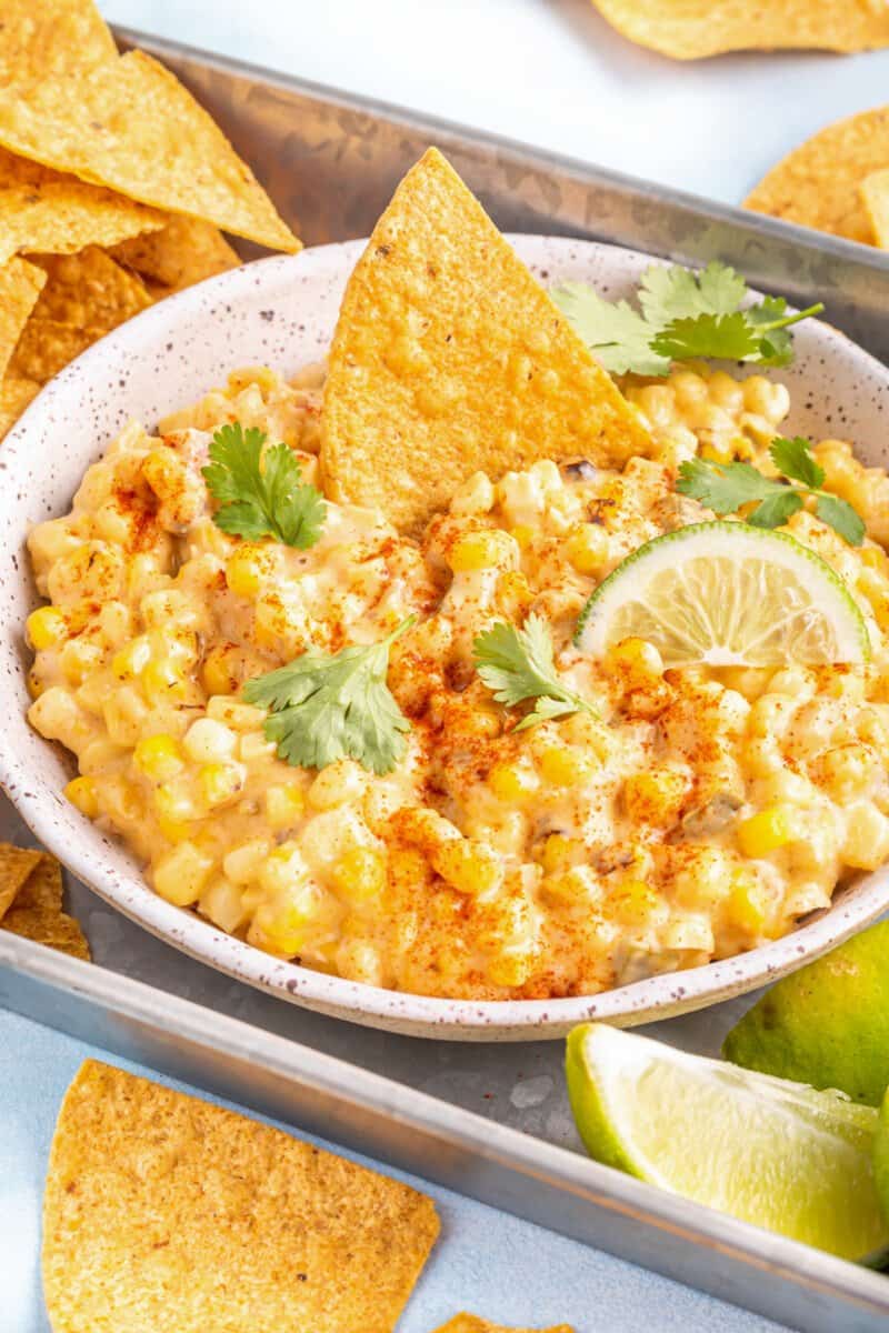 crockpot corn dip in a white bowl.