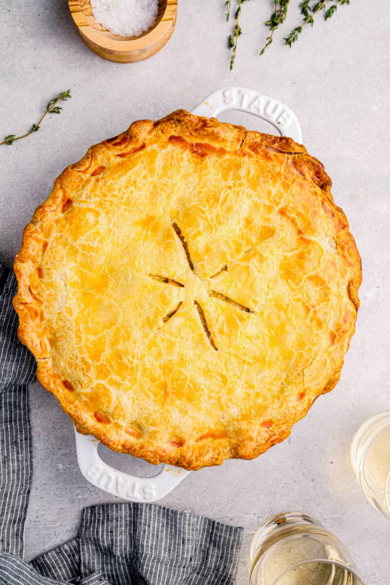 overhead view of chicken pot pie in a white pie pan.